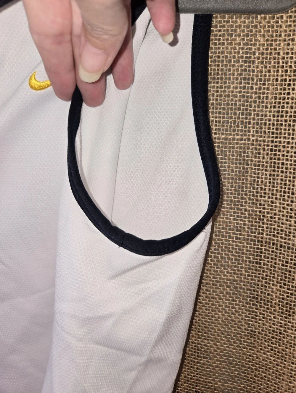 Nike White Sleeveless Polo Tank with Black Trim and Yellow Logo